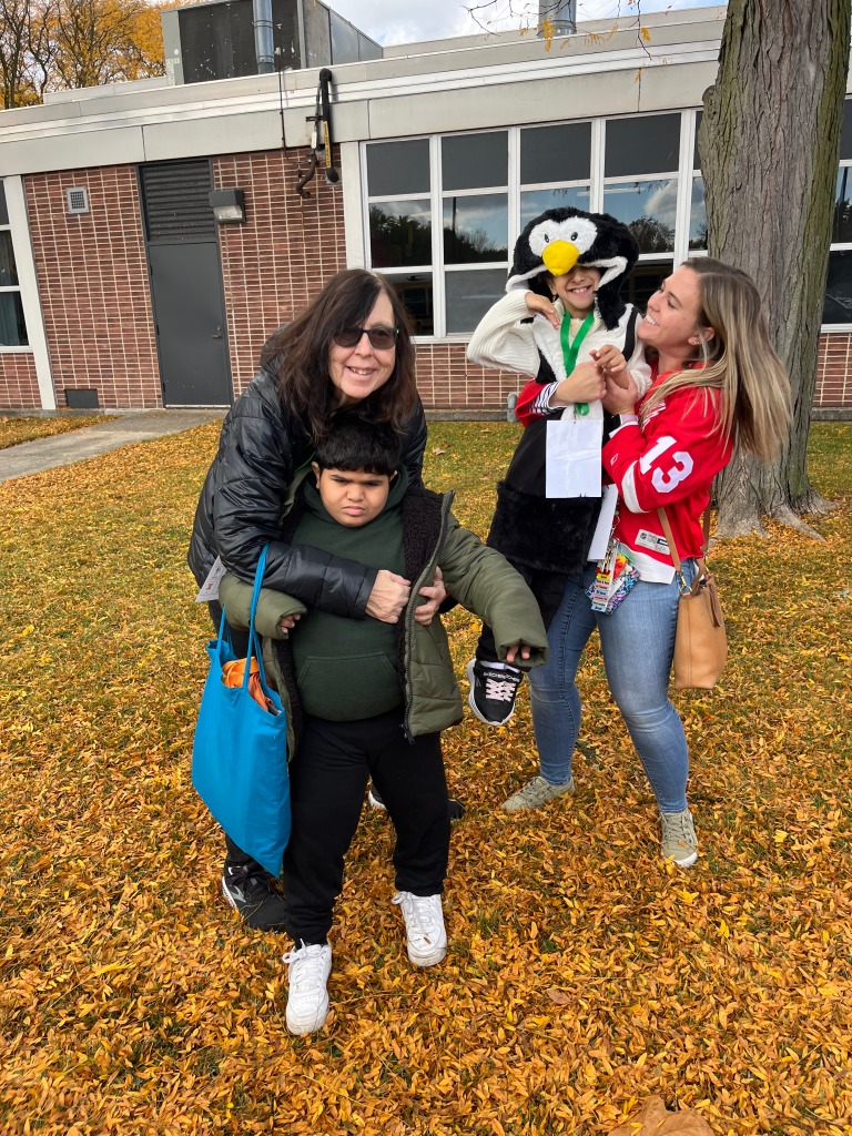 Trick or treating with students